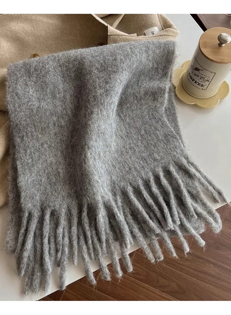 Luxuria A stylish, light gray, one-piece women's scarf, perfect for autumn and winter. This thick, double-sided scarf is warm and cozy, ideal for the office or everyday wear. A classic scarf to keep you warm, this large, curly gray scarf is a popular and warm winter accessory. - Image 1